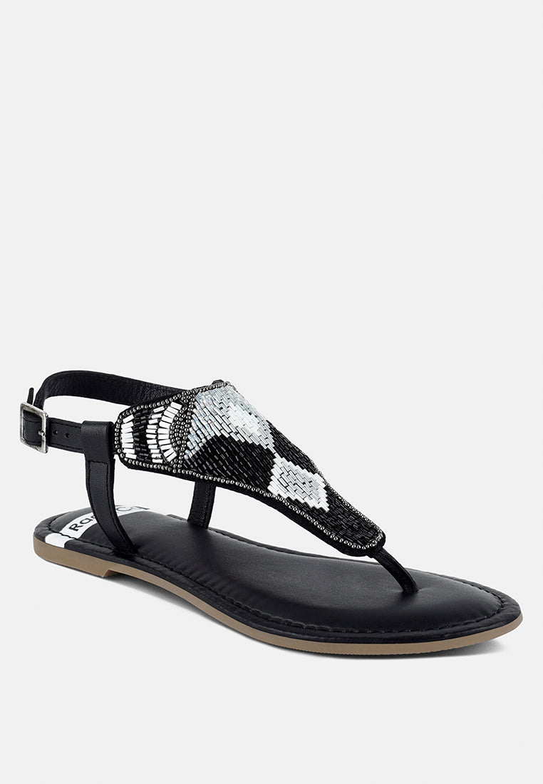 pin buckle beaded flat sandals by ruw#color_black