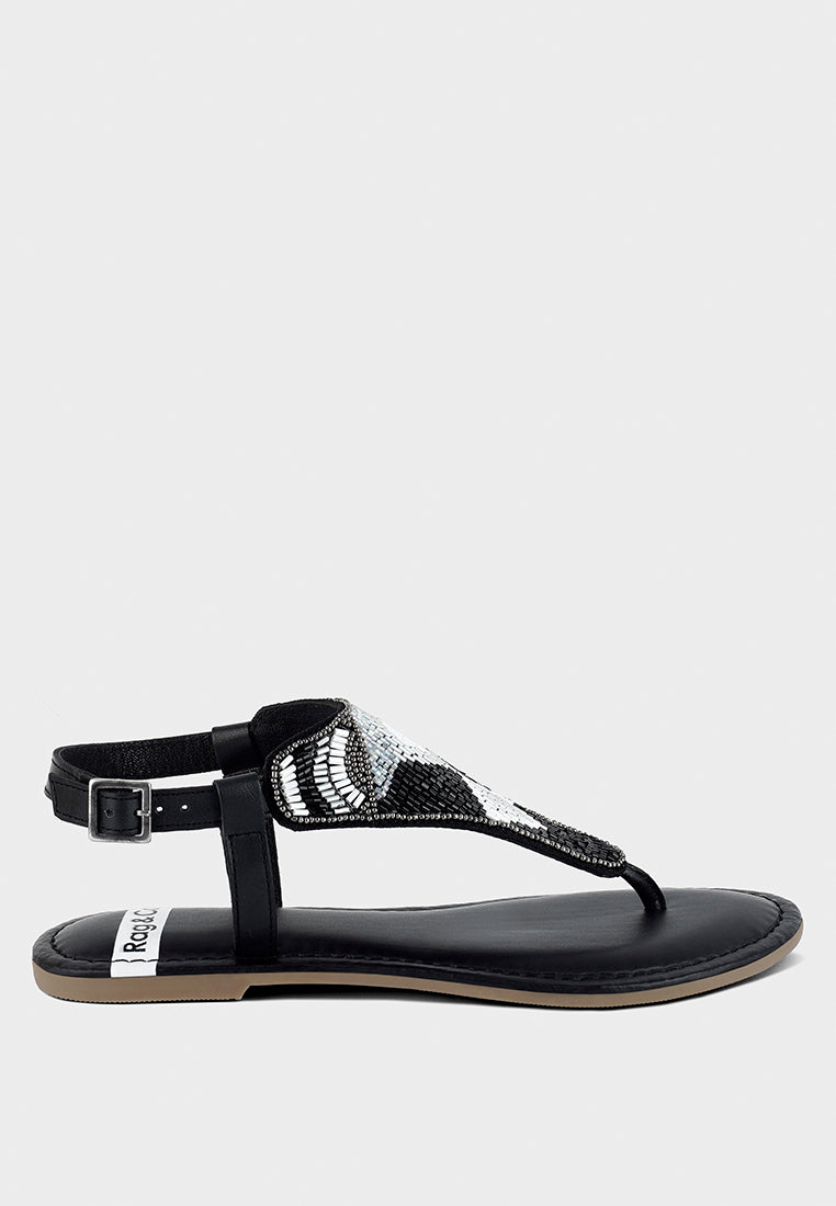 pin buckle beaded flat sandals by ruw#color_black