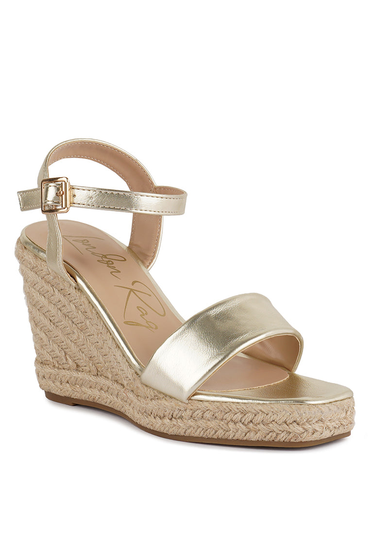 cake walk handcrafted sandals with a high wedge heel#color_gold