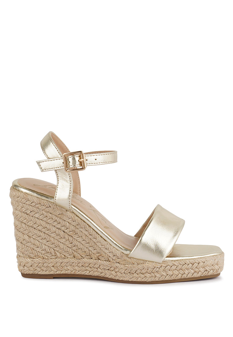 cake walk handcrafted sandals with a high wedge heel#color_gold