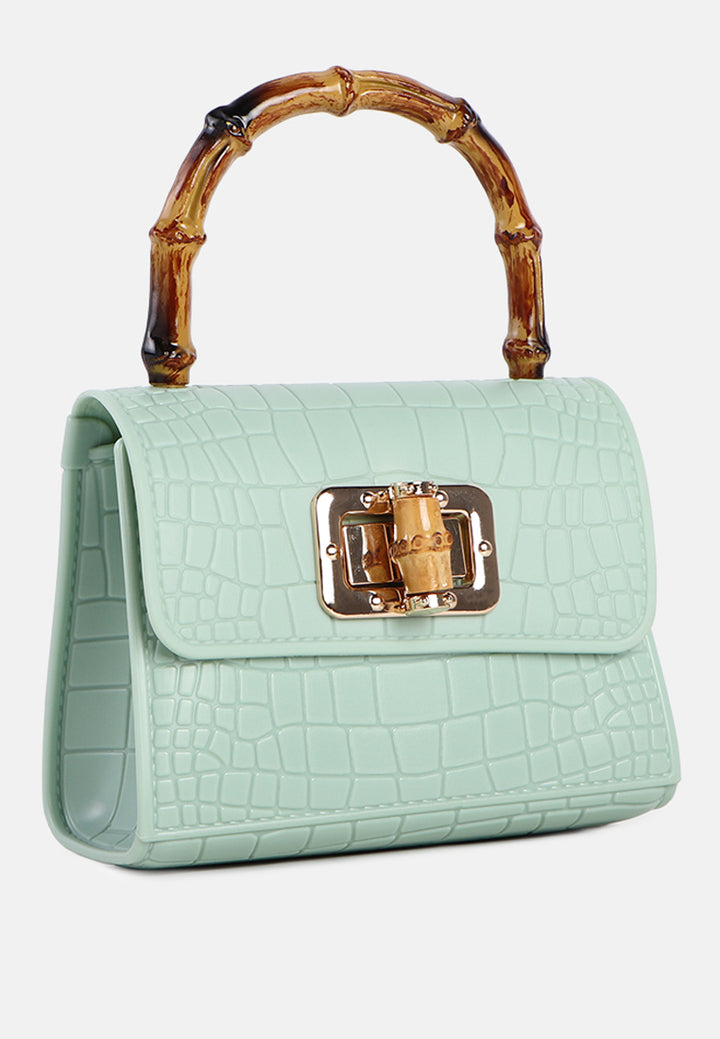 croc sling handbag#coor_mint