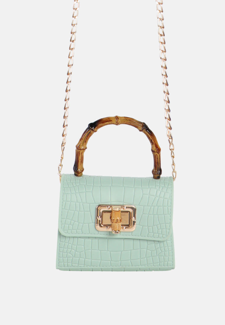 croc sling handbag#coor_mint