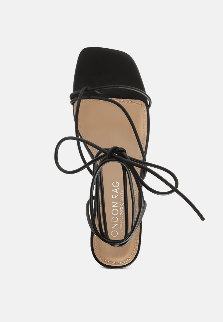 ahalya lace-up block heel sandals#color_black