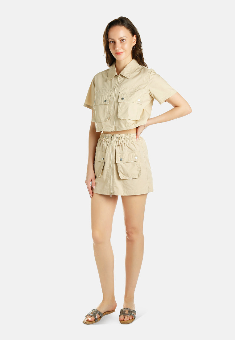 flap pocket cargo mini skirt by ruw#color_lrish-cream