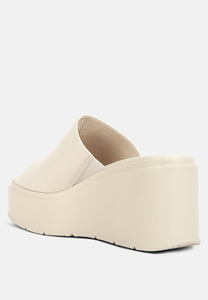 chunky slip on platforms by ruw#color_off-white