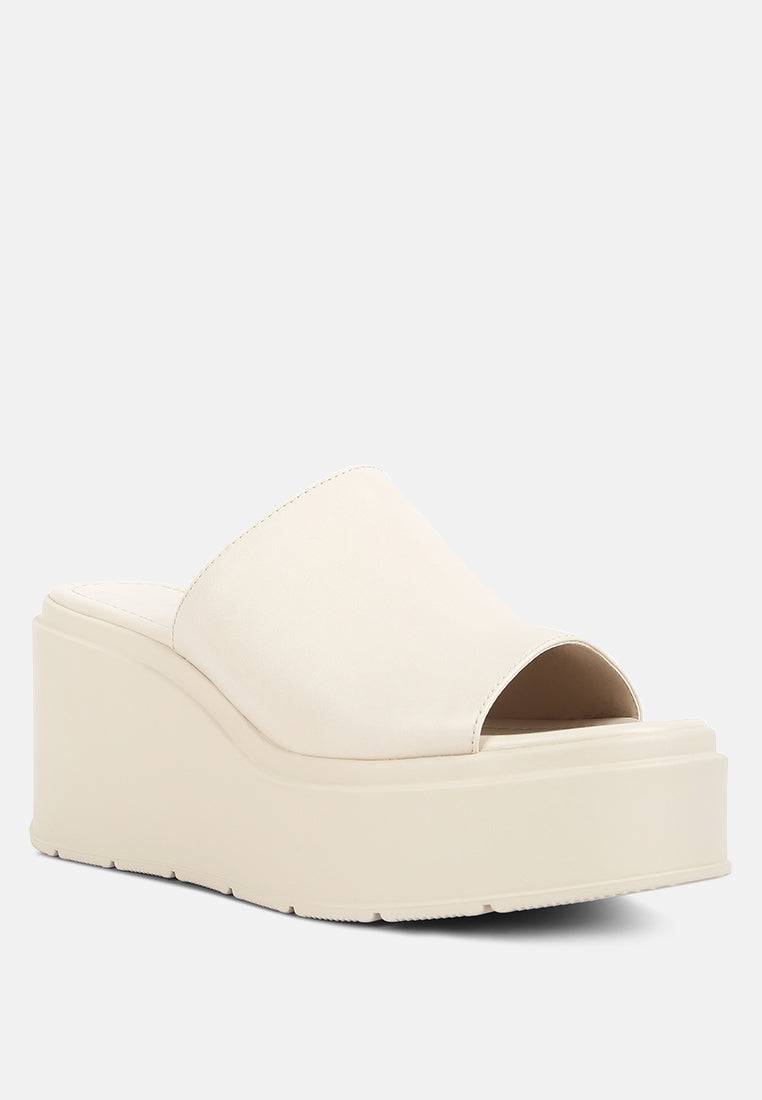 chunky slip on platforms by ruw#color_off-white