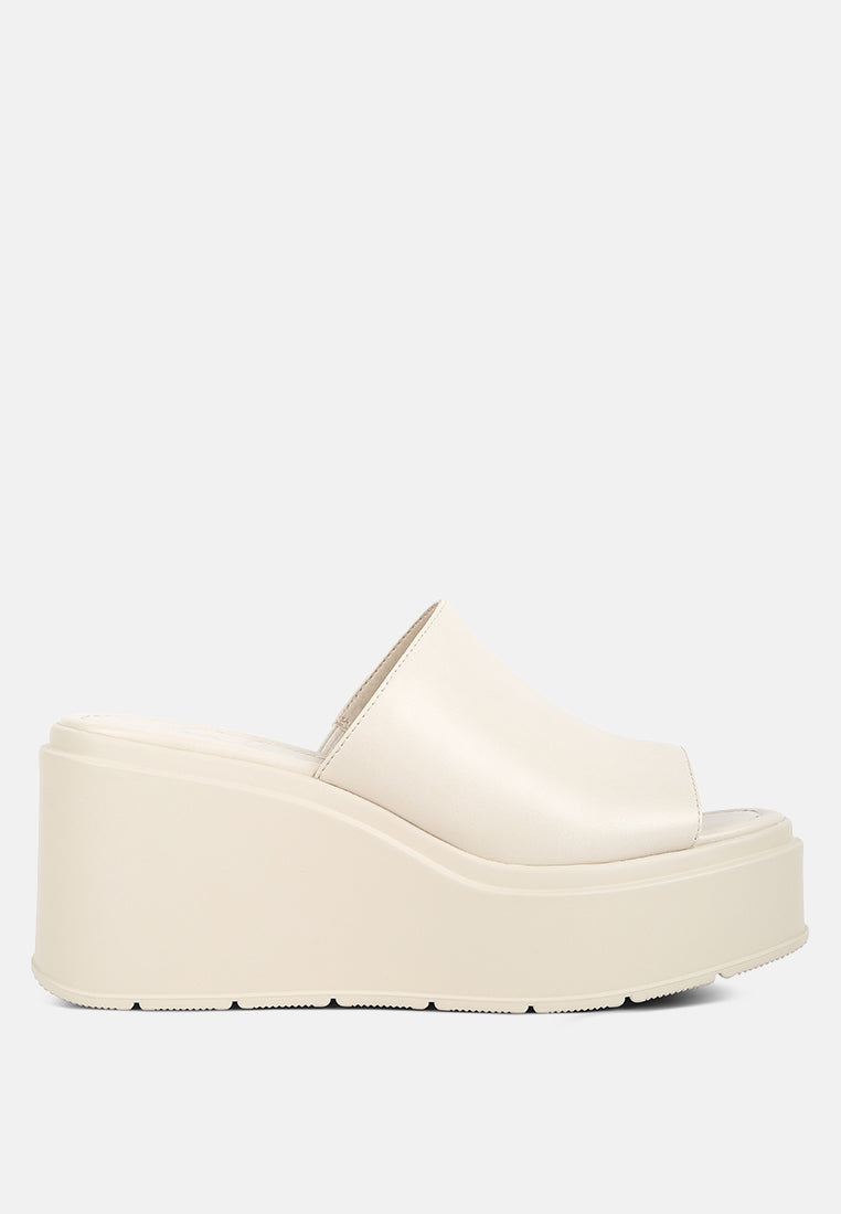 chunky slip on platforms by ruw#color_off-white