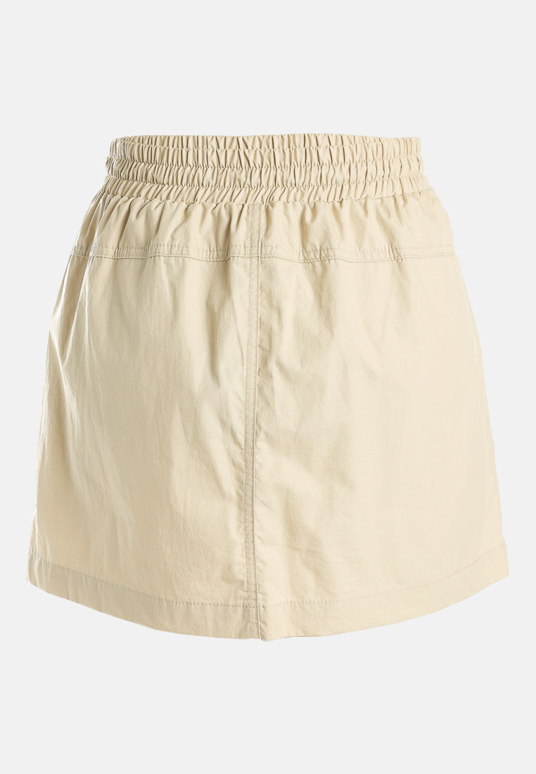 flap pocket cargo mini skirt by ruw#color_lrish-cream