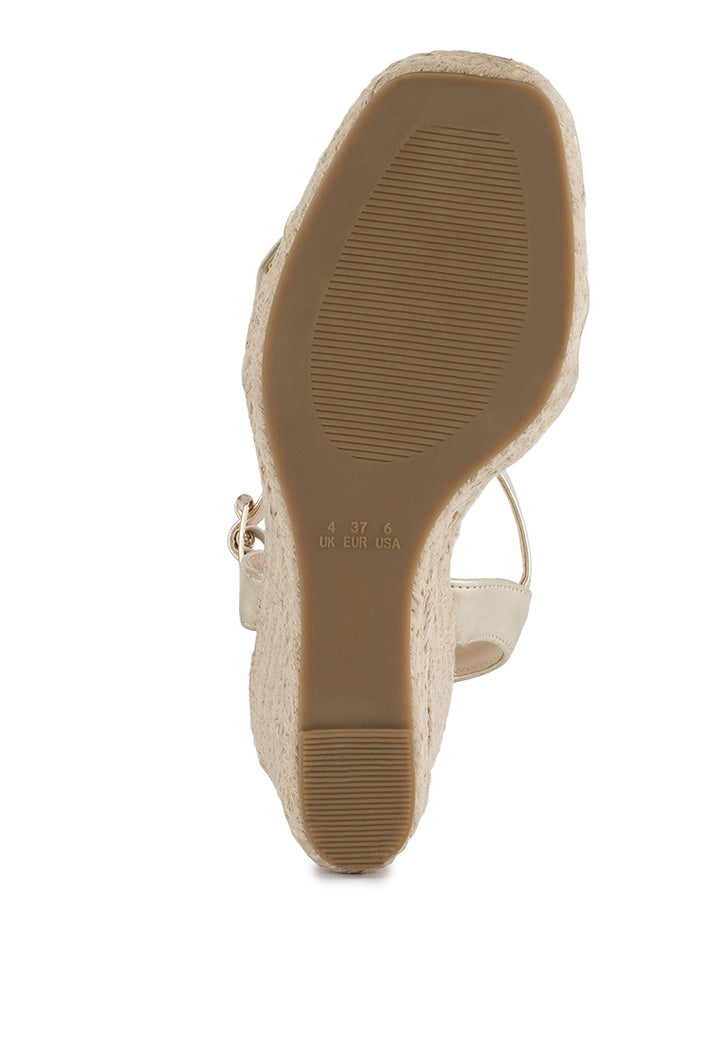 cake walk handcrafted sandals with a high wedge heel#color_gold