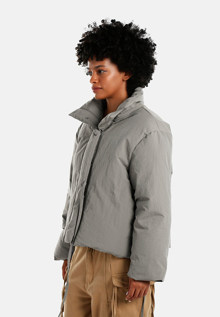 high-neck tie waist quilted jacket#color_taupe