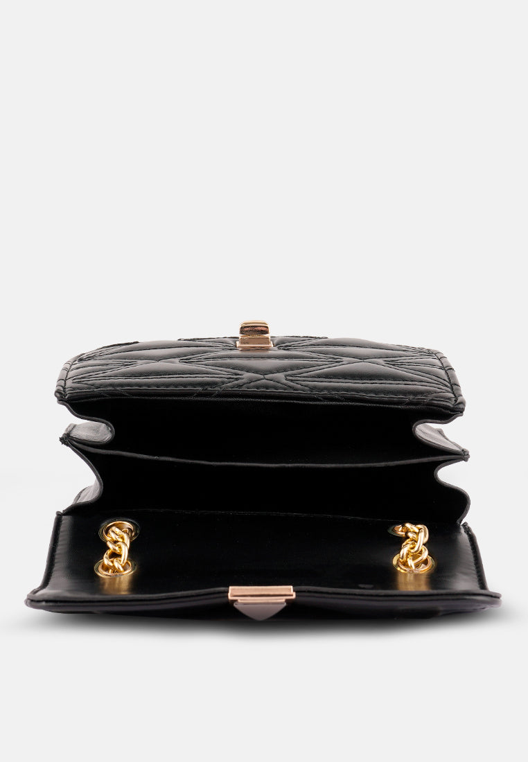 quilted multi metal strap handbag#color_black
