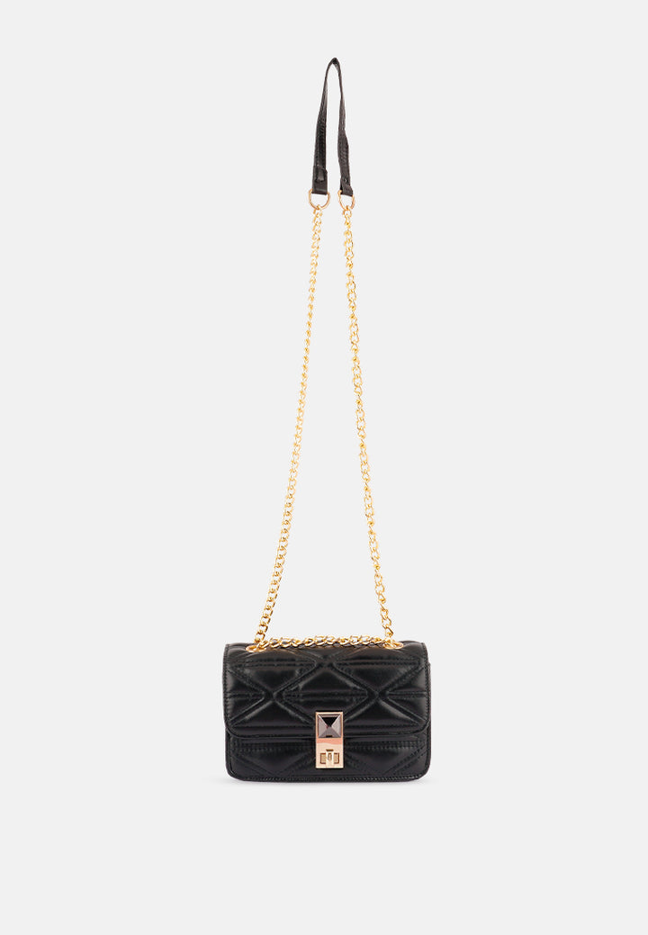 quilted multi metal strap handbag#color_black