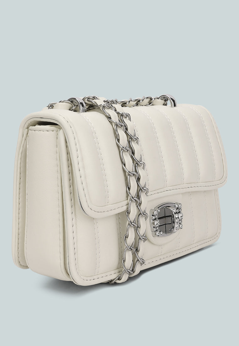 rhinestone embellished lock flap bag#color_off-white