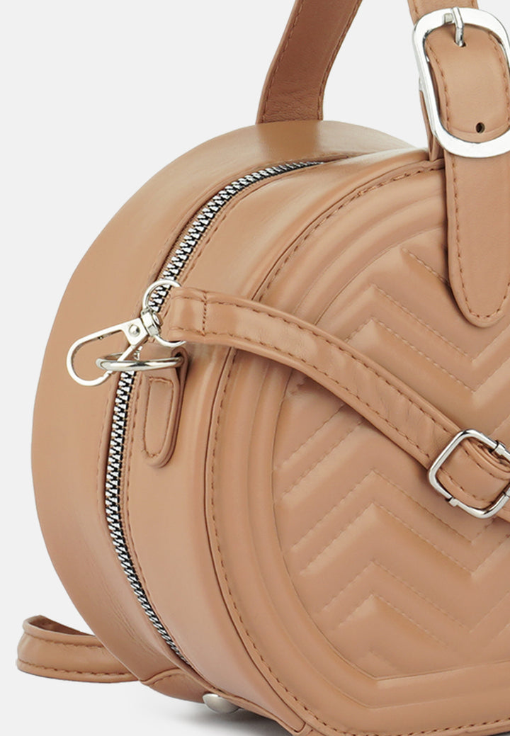 round quilted sling bag#color_tan