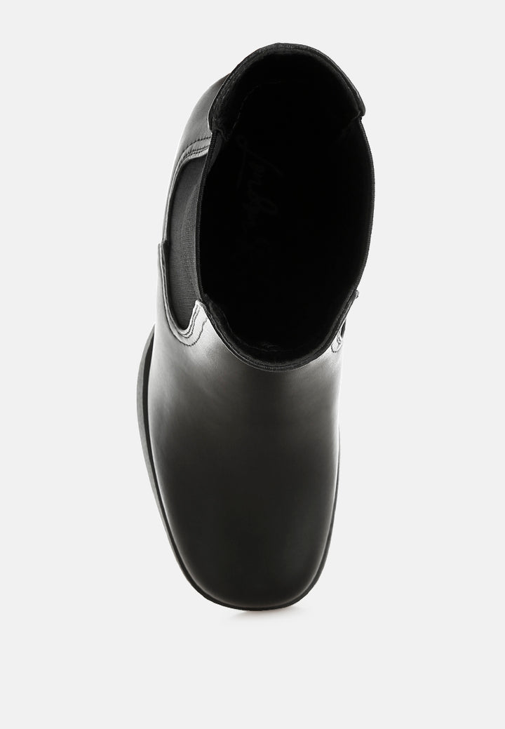 scuala faux leather chelsea boots#color_black