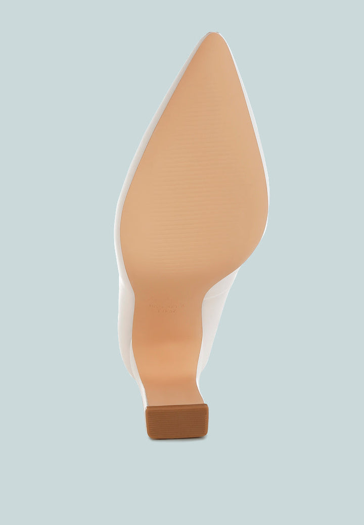 shacarri faux leather pumps #color_white
