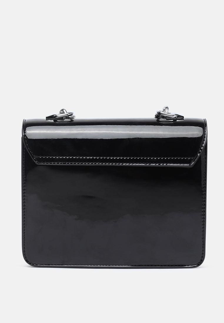 classic sling bag with twist and lock closure#color_black
