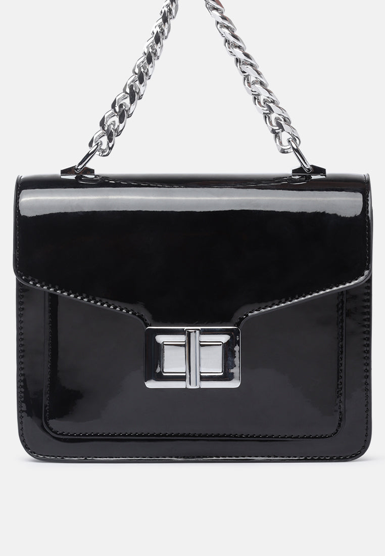 classic sling bag with twist and lock closure#color_black