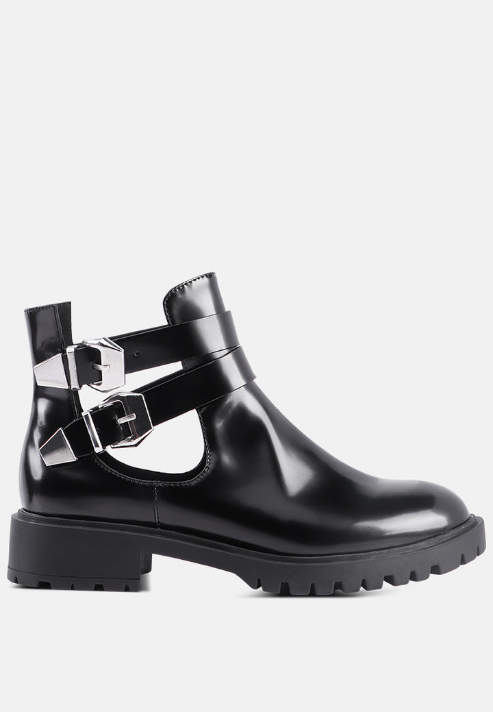 erner adjustable cut-out buckle boots#color_black