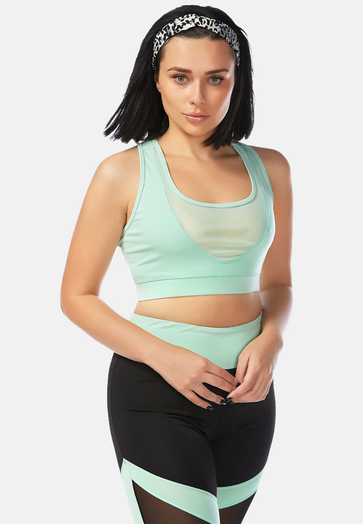 geometric paneled mesh yoga leggings#color_black-sea-salt-green