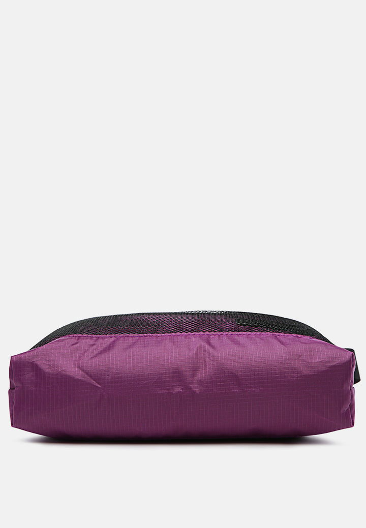 on the move cross body bag#color_purple