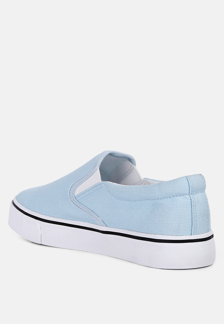 riddler light blue slip on canvas sneakers#color_light-blue