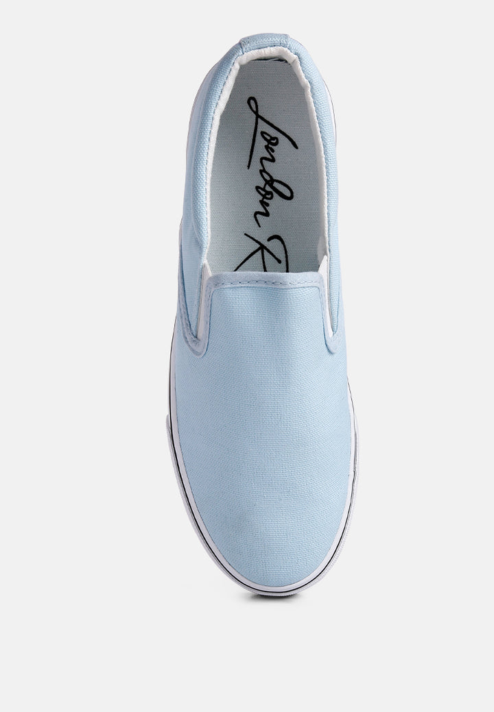 riddler light blue slip on canvas sneakers#color_light-blue