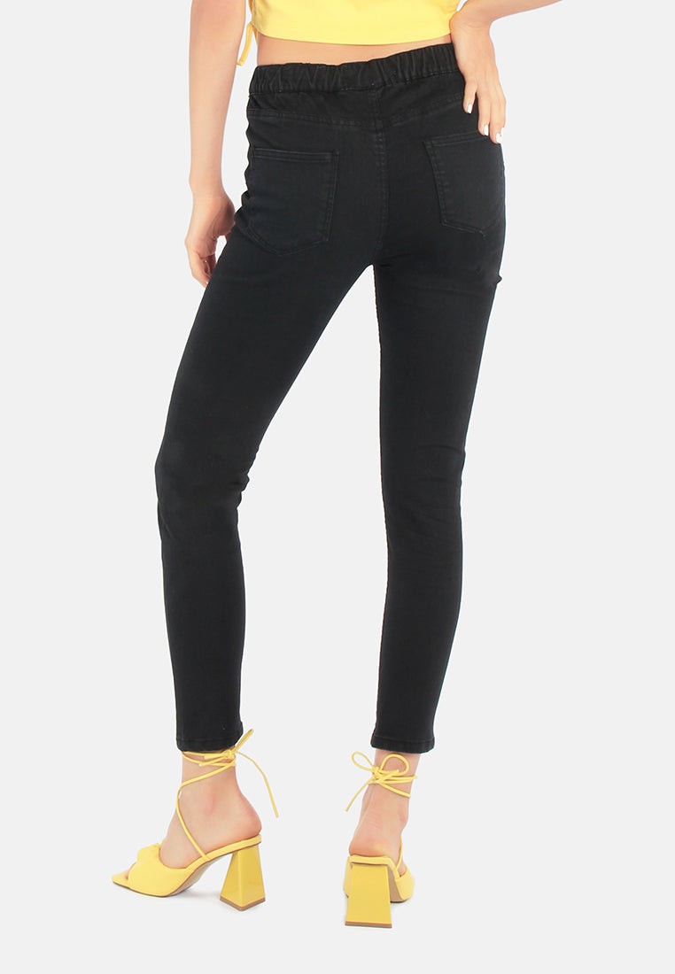 light blue washed denim jeggings#color_black