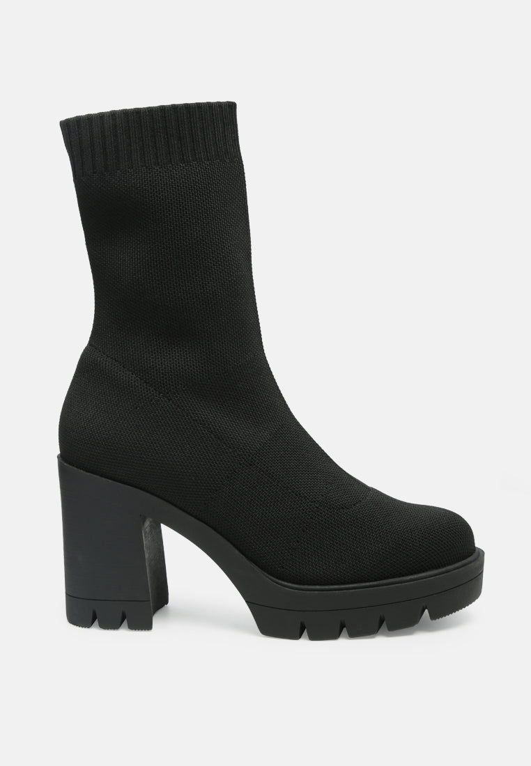 zinnia knitted block heeled boots#color_black