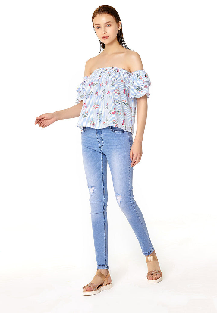 slim fit distressed jeans#color_light-blue